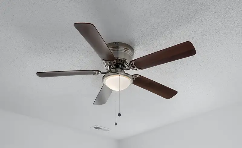 Closeup photo of a ceiling fan.