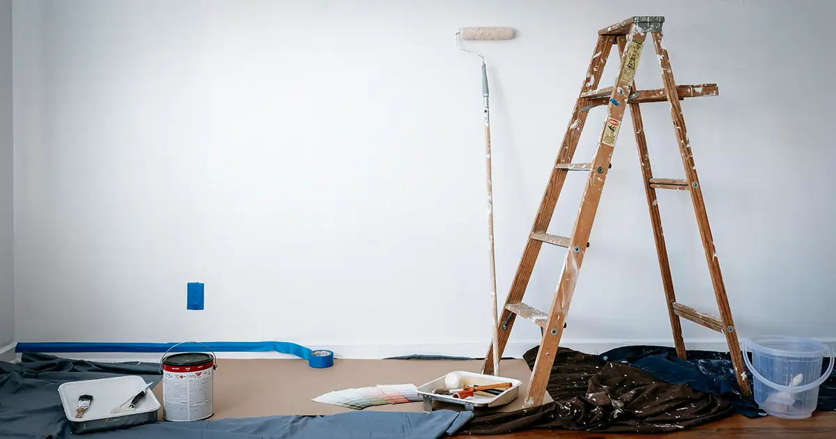 A ladder and a paint roller as this home is being remodeled.